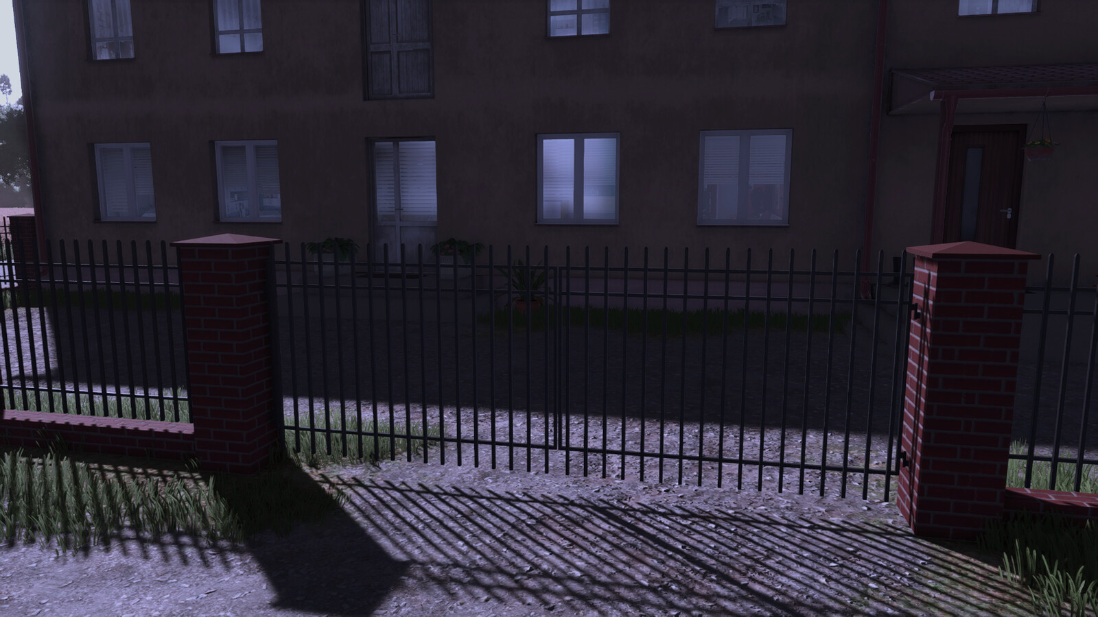 Red Brick And Metal Fence